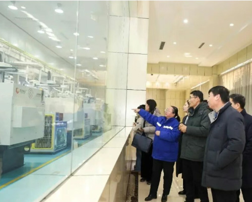 A Research Delegation from the China Grain Research and Training Center Visits Xiwang Group for an Inspection Tour